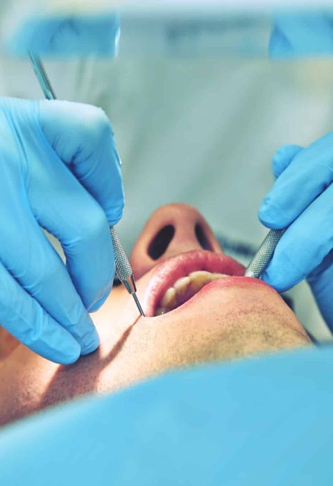 Young man in dentist office